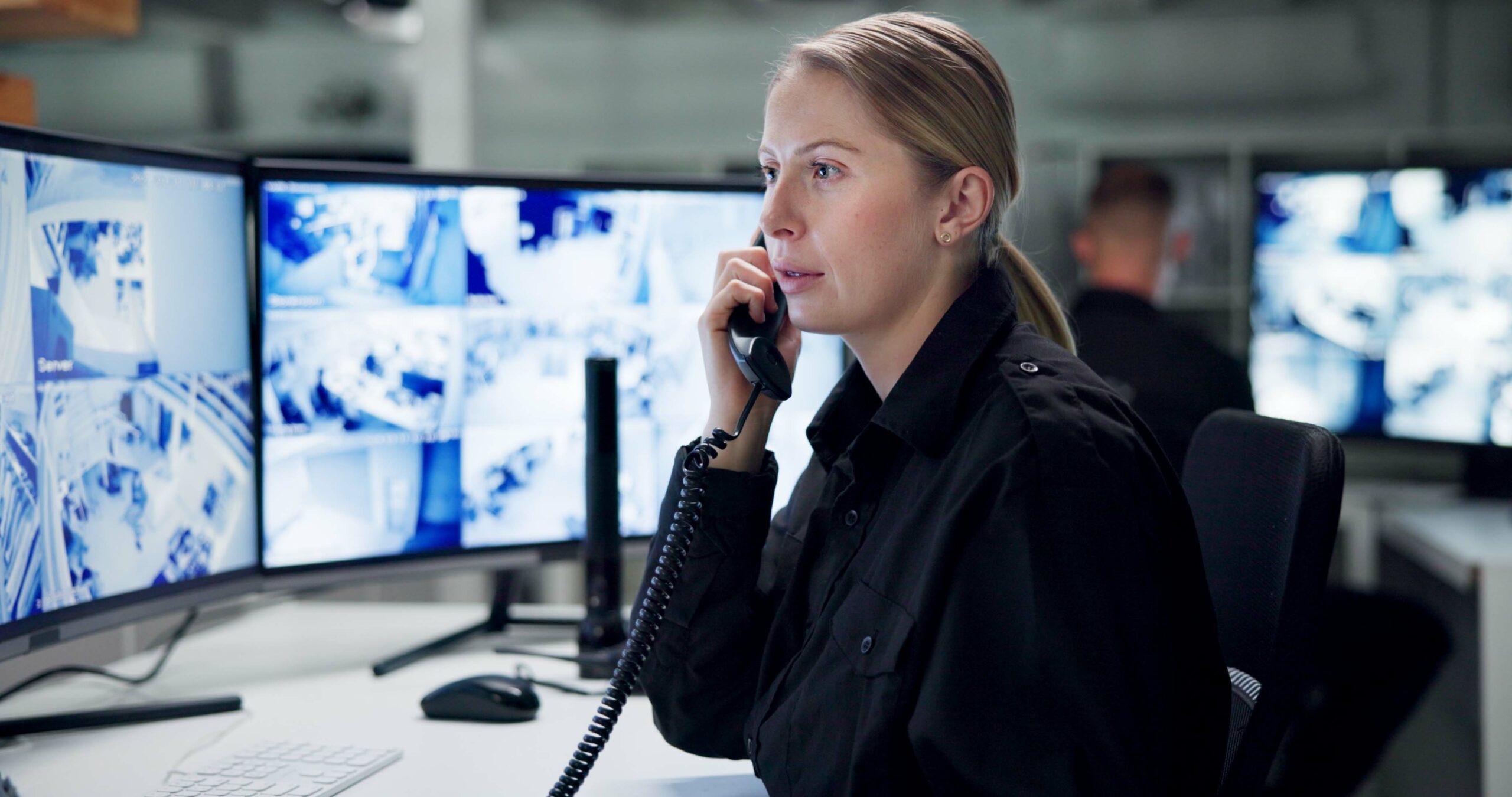 Communication, security and woman with telephone, monitor and watch of cctv, danger and control roo.